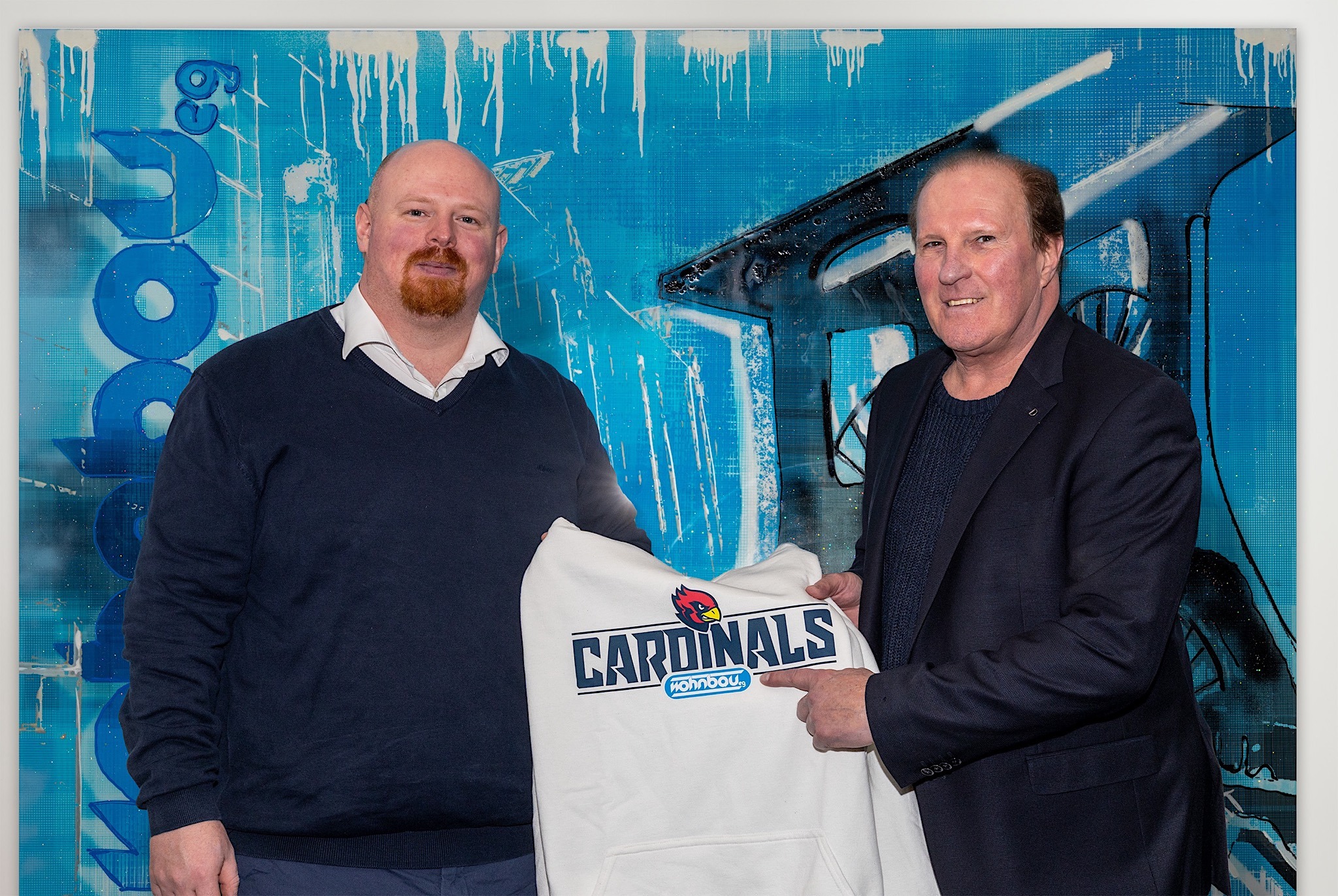 Foto: Cardinals-Präsident Marco Mitschek (li.) und Frank Skrube, Wohnbau eG Essen. @Assindia Cardinals